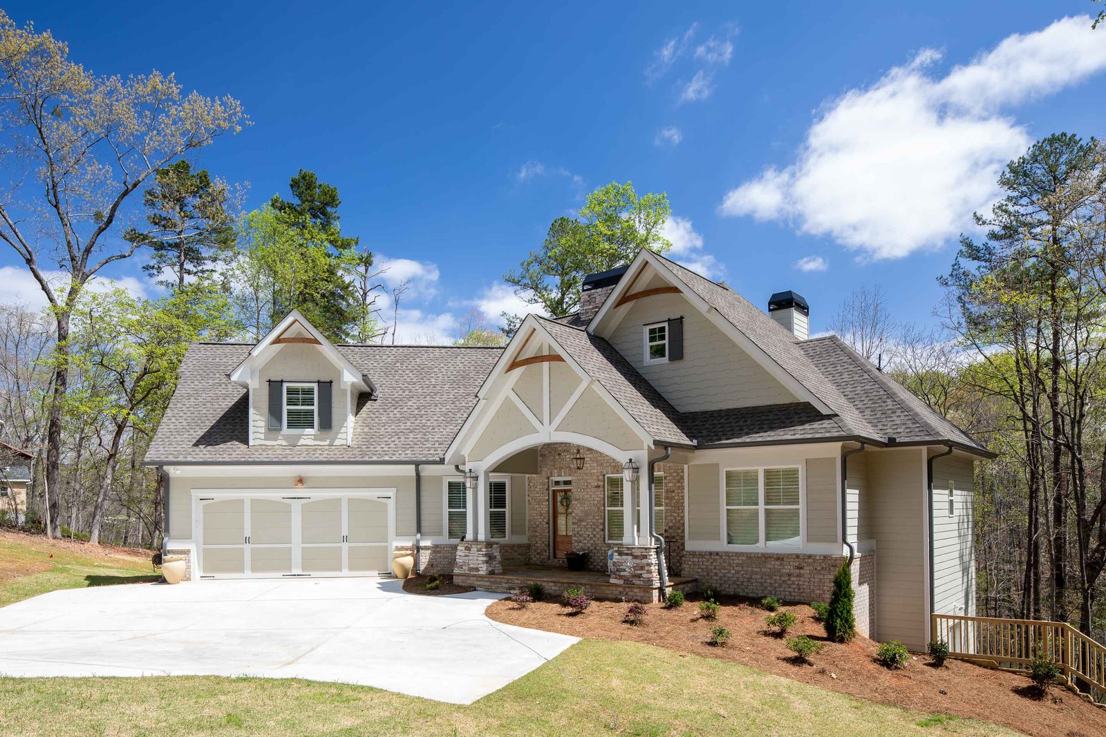 Craftsman front elevation seen from the yard — Imbriale, custom home built by Ironwood Construction Group